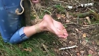 Barefoot Babe Gets Tied Up Outdoors In Amateur Foot Fetish Video