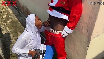 Enjoy A Naughty Christmas Encounter With Santa And A Stunning Hijabi Babe. Subscribe To Red For More