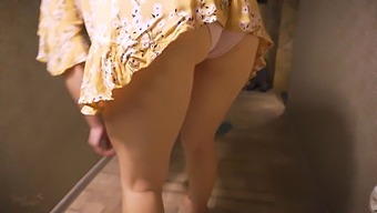 A Milf'S Naughty Upskirt Display In The Bedroom